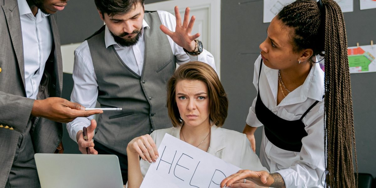 A diverse group of remote team members actively collaborating and problem-solving during an online activity, demonstrating effective virtual engagement.