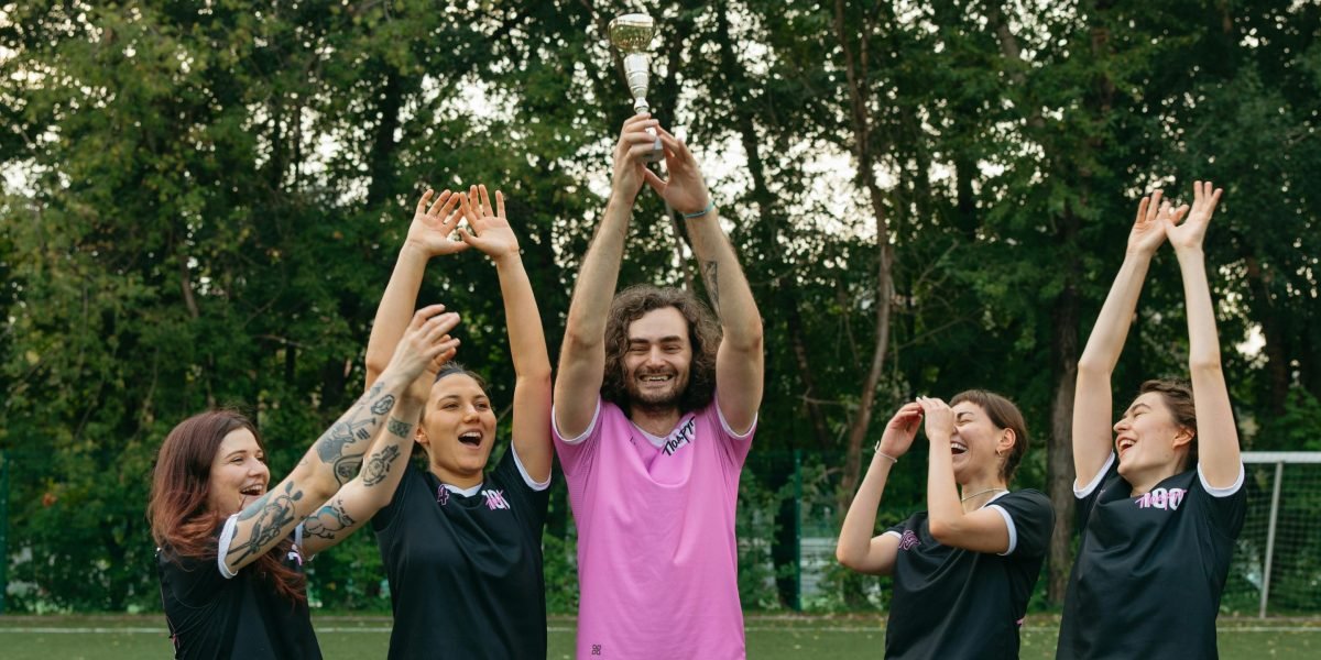 A group of colleagues celebrating a small win or shared success, fostering camaraderie and positive energy.