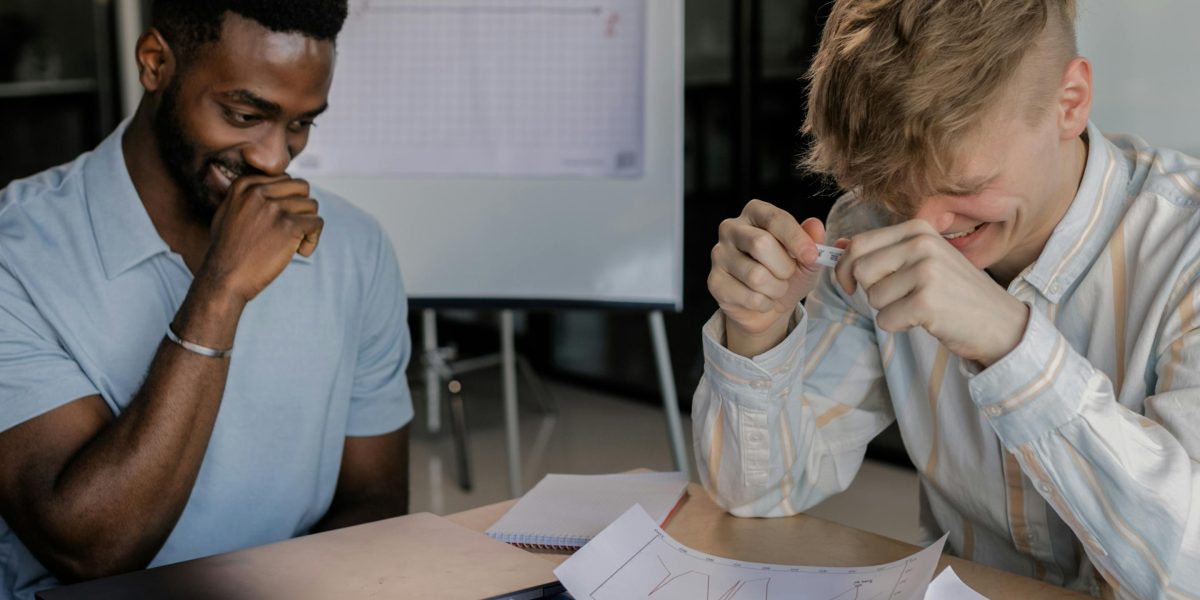 Teams engaging in a lighthearted, collaborative activity, fostering connection and trust.