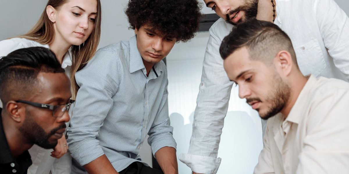 Remote team members actively collaborating and problem-solving during a virtual activity.