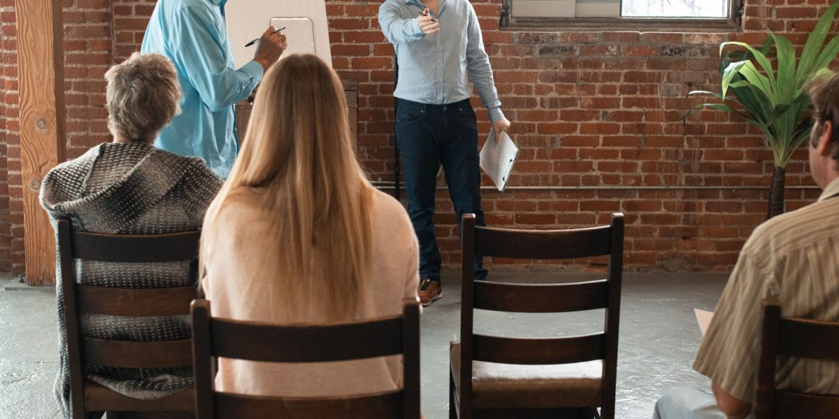 A facilitator guides a remote team through an interactive session, ensuring smooth gameplay and inclusive participation.